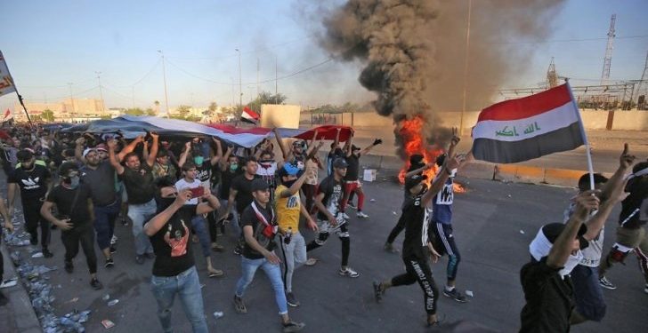 متظاهرين العراق