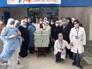 مستشفى العجمى للعزل بالإسكندرية توزع كحك العيد على المصابين بفيروس كورونا 3