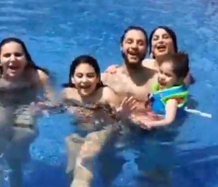 الفيشاوي وعائلته من داخل حمام السباحة: "وقت الصيف مع بناتي".. فيديو 1