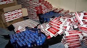 ضبط 5  آلاف علبة سجائر مجهولة المصدر لدى أحد التجار بكفر الشيخ 5