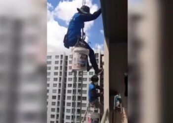 "امرأة بلا رحمة".. تقطع حبل الأمان عن عاملين أثناء طلاء برج شاهد|بالفيديو 3