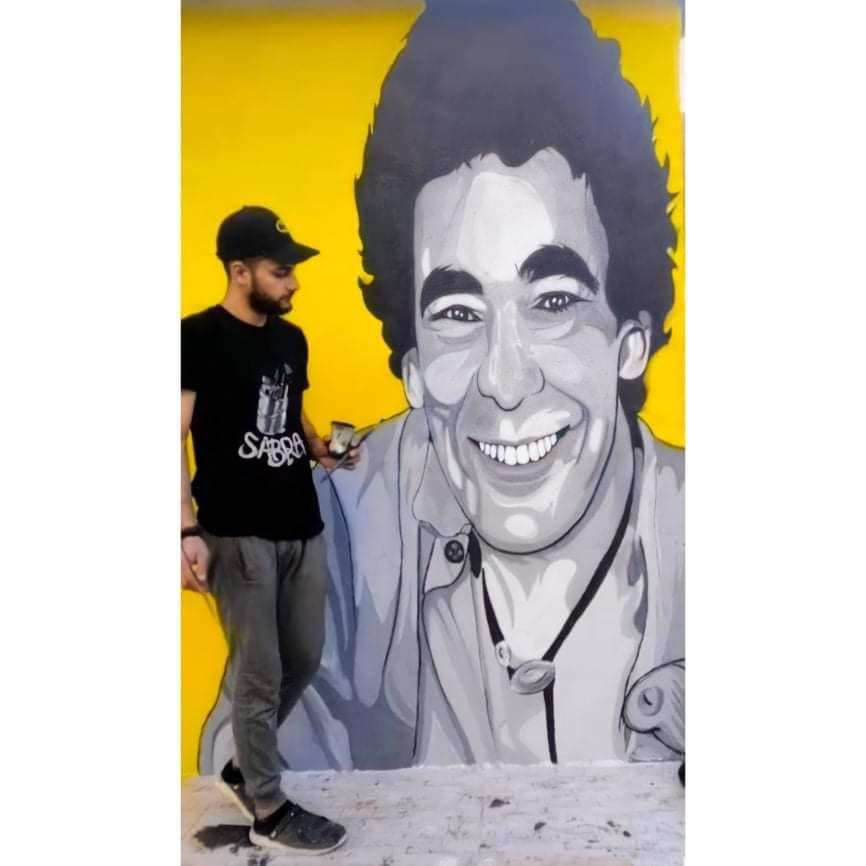يبدع فى رسوماته على الطريقة الأوروبية.. "أحمد صبرة" أشهر رسام "جرافيتى" بـ الإسماعيلية 2