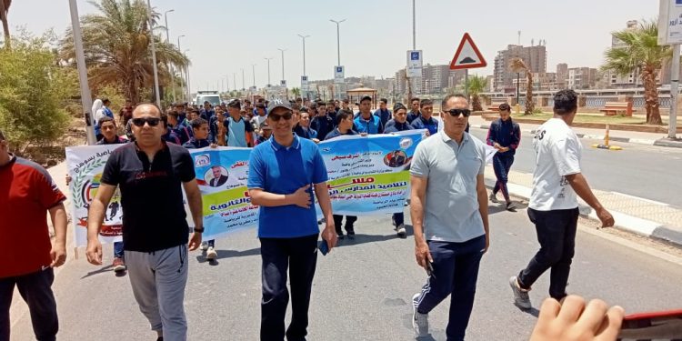 مسيرة مشي لتلاميذ المدارس الرياضية الإعدادية والثانوية بسوهاج