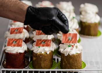 epa10365404 Uw Voordeelbakker bakes cakes with the Moroccan flag, at a Moroccan bakery in The Hague, Netherlands, 14 December 2022, prior to Morocco's semi-final match against France at the World Cup in Qatar.  EPA-EFE/Bart Maat
