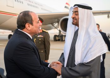 ABU DHABI, UNITED ARAB EMIRATES - February 12, 2023: HH Sheikh Mohamed bin Zayed Al Nahyan, President of the United Arab Emirates (R), receives HE Abdel Fattah El Sisi, President of Egypt (L), at the Presidential Airport. 

( Hamad Al Kaabi /  UAE Presidential Court )
---