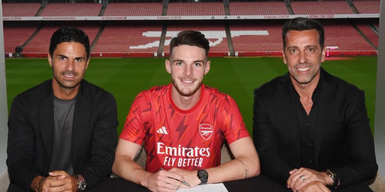 LONDON, ENGLAND - JULY 15: (L) Arsenal manager Mikel Arteta with new signing Declan Rice and (R) Sporting Director Edu at Emirates Stadium on July 15, 2023 in London, England. (Photo by Stuart MacFarlane/Arsenal FC via Getty Images)