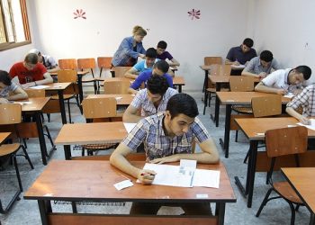 Syrian students sit their end of year exams at a high school in the capital Damascus, on June 18, 2013. Across Syria students are sitting their exams at sate-run schools, after which, if successful, they will continue their education at a university. AFP PHOTO / LOUAI BESHARA        (Photo credit should read LOUAI BESHARA/AFP via Getty Images)