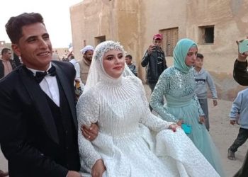 بالفستان الأبيض والبدلة.. عروسان يدليان بصوتيهما قبل زفافهم في انتخابات الرئاسة 2024 بـ شمال سيناء 7